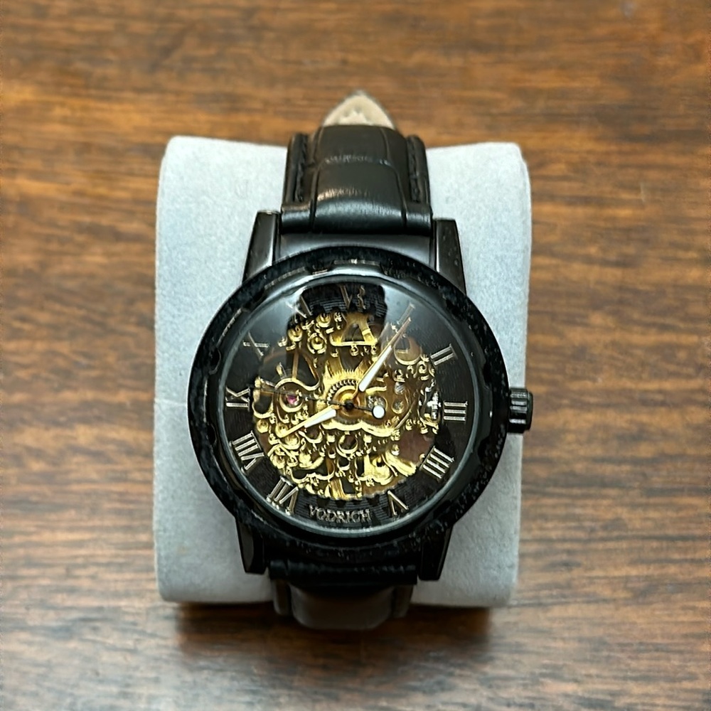 Black and gold Vodrich watch